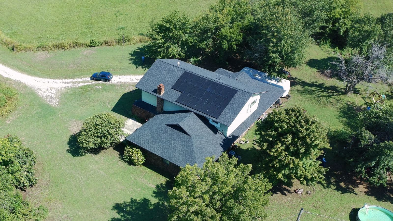 Rooftop home solar array on a farmhouse, Coffeyville